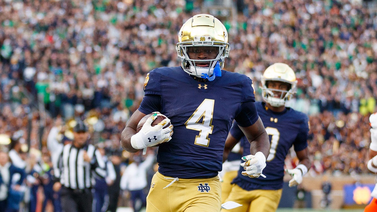 Notre Dame star 'already over' playoff snub, defends bowl opt-out as he hopes for Heisman Trophy win at george magazine