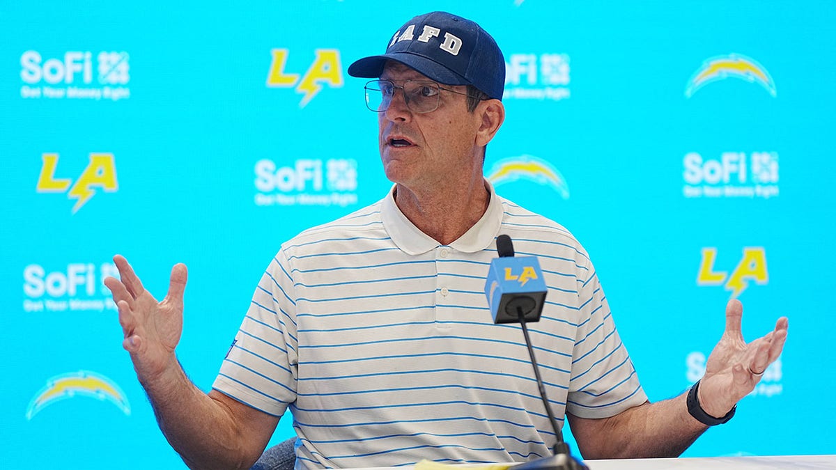 Former Michigan coach Jim Harbaugh reacts to Sherrone Moore's firing and charges at george magazine