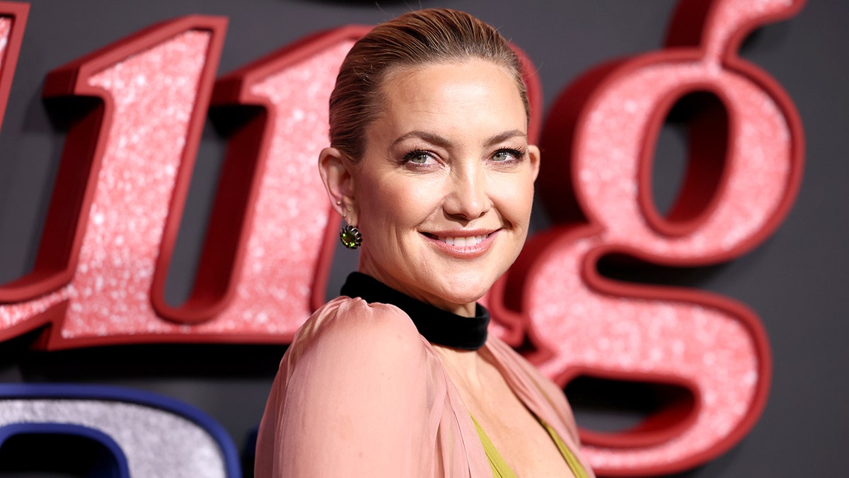 Kate Hudson wows in plunging gown at 'Song Sung Blue' NYC premiere at george magazine