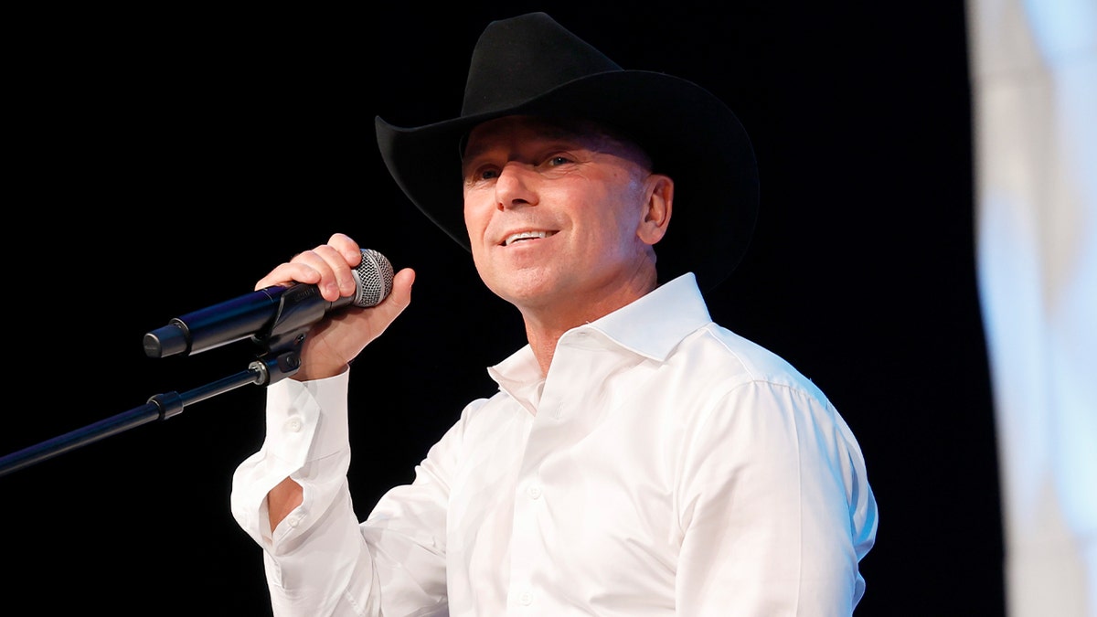 Kenny Chesney admits he 'snapped' and punched fan in the mouth during concert performance  at george magazine