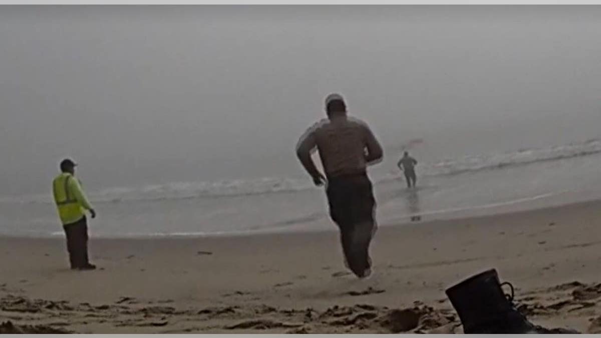 LA deputies caught on camera racing into foggy ocean to rescue disoriented paragliders at george magazine