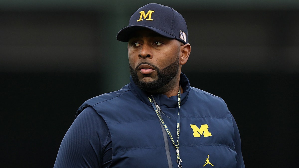Fired Michigan coach Sherrone Moore accused of stalking victim 'for months' in police dispatch audio  at george magazine