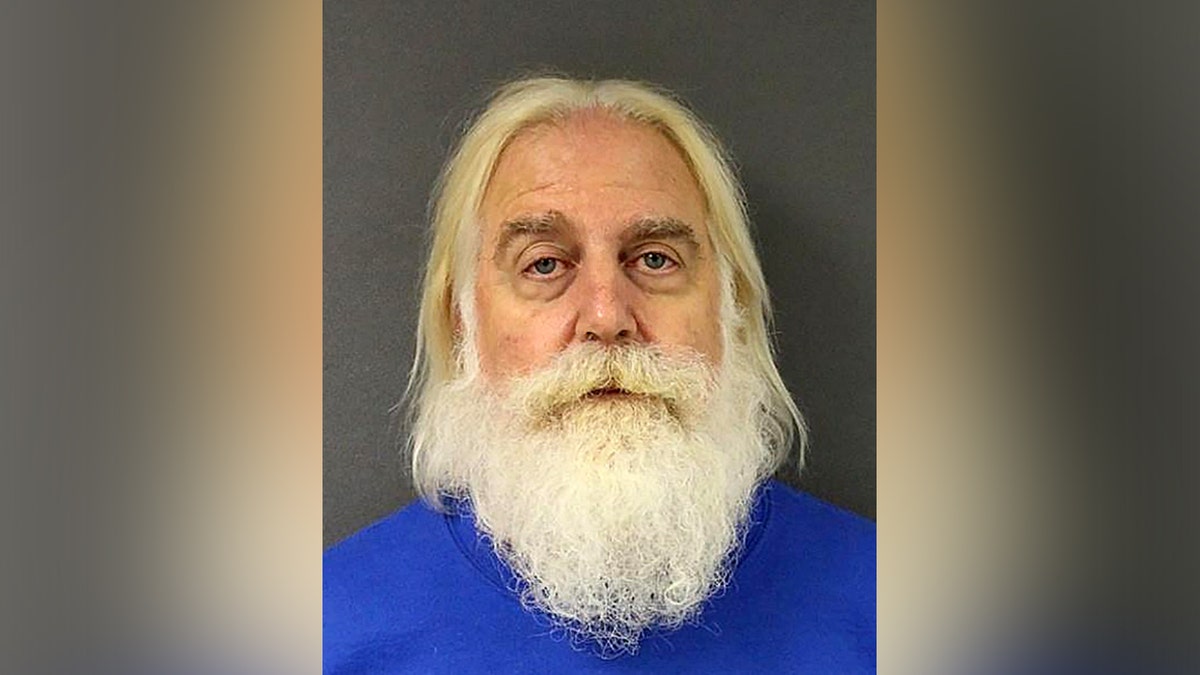 Retired elementary teacher who worked as Santa arrested on child abuse material charges at george magazine