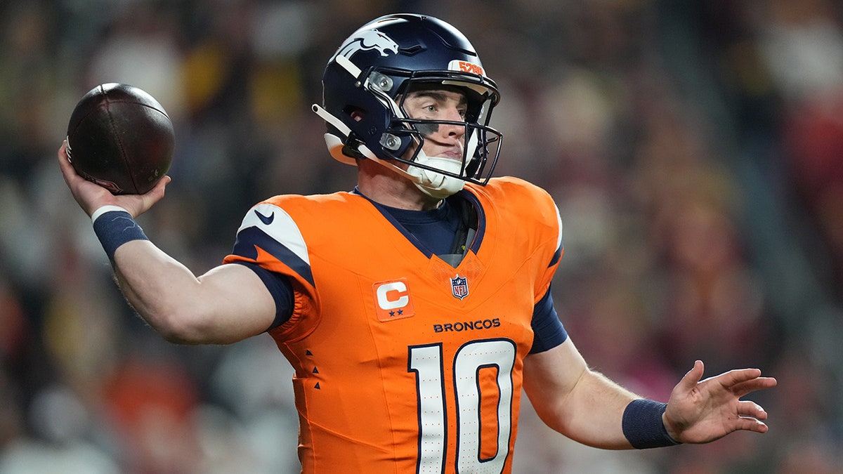 Broncos' Bo Nix throws TD pass while falling to ground in stunning play  at george magazine