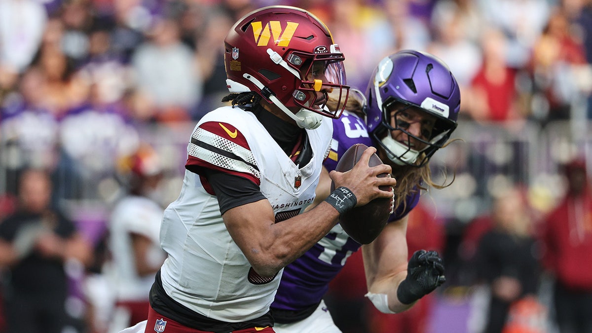 Commanders' Jayden Daniels takes hit after interception, re-injures shoulder at george magazine