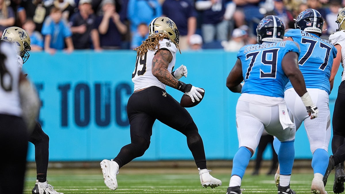 Saints star rips ball away from Titans rookie QB, scores touchdown at george magazine