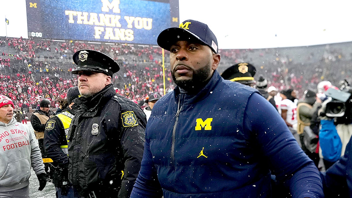 Michigan president calls Sherrone Moore's conduct a 'breach of trust' after shocking dismissal and arrest at george magazine
