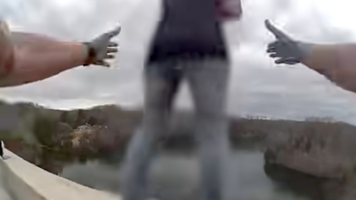 Tennessee officers rescue woman considering jumping from bridge on day after Christmas at george magazine