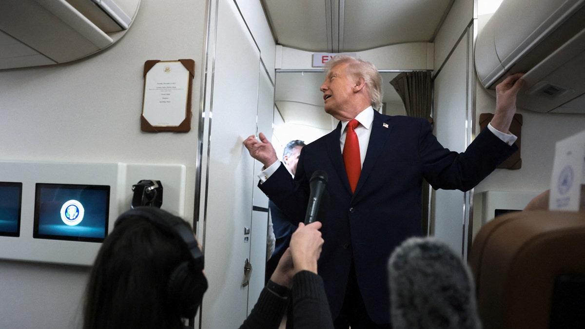 Trump repeatedly bumped by bathroom door during hilarious AF1 gaggle: 'Come on out!'  at george magazine
