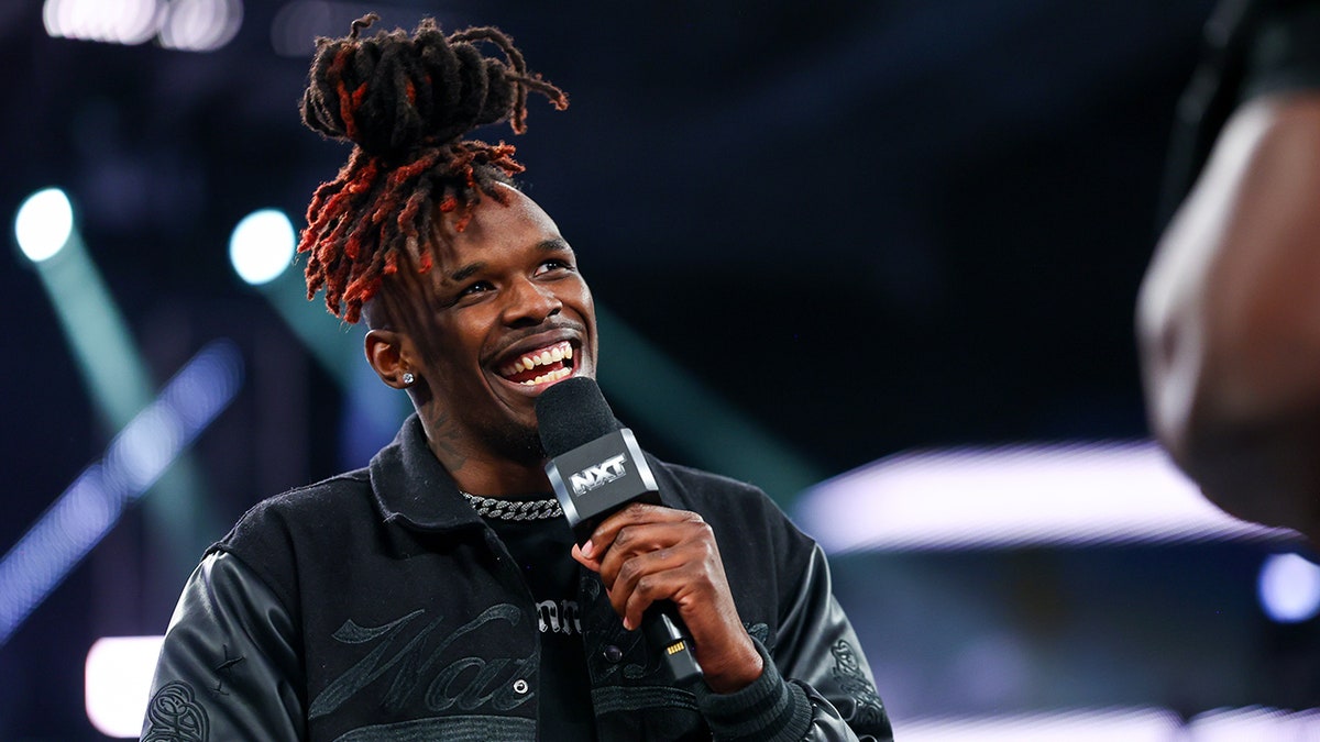 WWE's Je'Von Evans talks pursuit of pro wrestling passion, ignoring critics and John Cena honor at george magazine