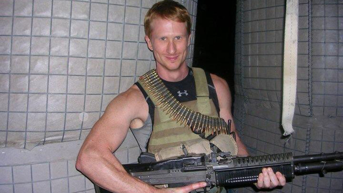 Navy vet who beat CNN in defamation trial teams up with 'American Sniper' co-author for upcoming spy memoir at george magazine