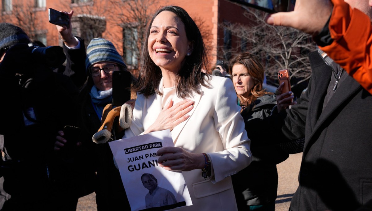 Venezuela opposition leader presents Trump with Nobel Peace Prize at george magazine