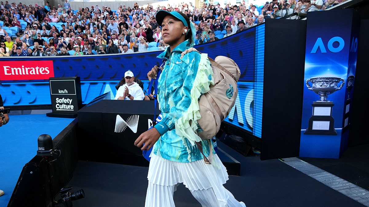 Naomi Osaka's Australian Open run ends in heartbreak with abdominal injury at george magazine