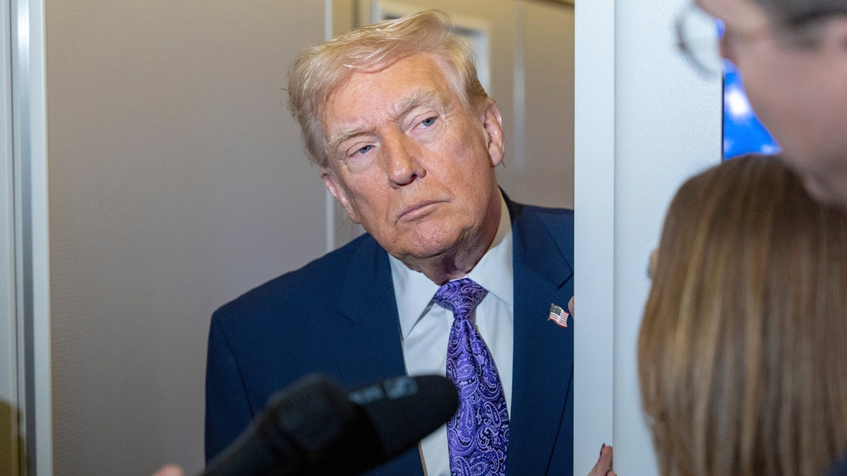 Trump says Iran 'starting to' cross US red lines as protesters die in government crackdown at george magazine