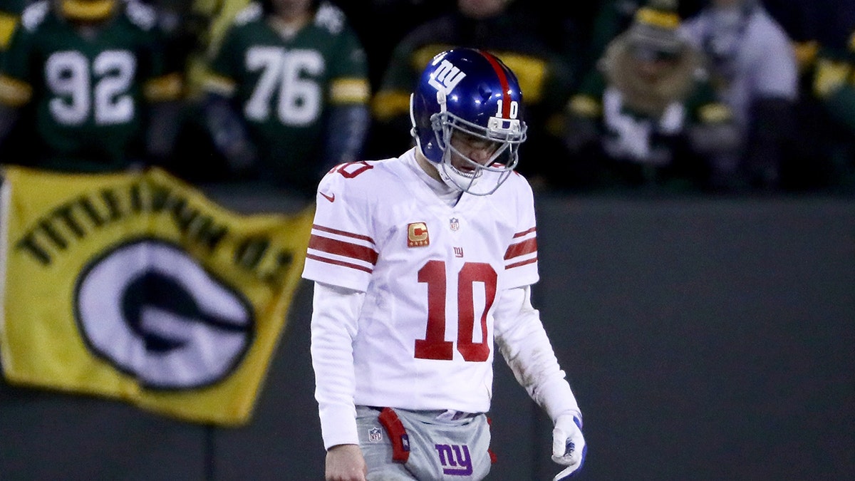 Eli Manning implores teams to 'lose with grace' after Miami's postgame antics: 'Doing nothing is OK' at george magazine