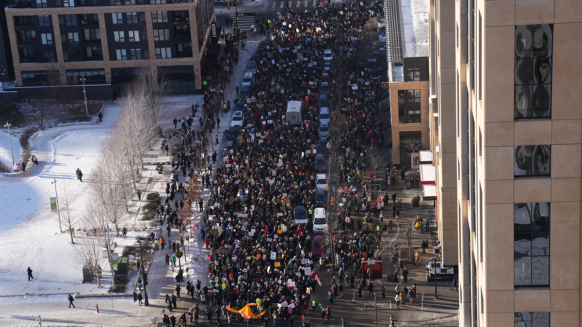 Thousands march through Minneapolis, swarm Target Center demanding ICE removal from Minnesota at george magazine