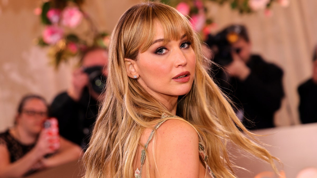 Jennifer Lawrence says she 'identifies as a stay-at-home mom' despite her Hollywood success at george magazine