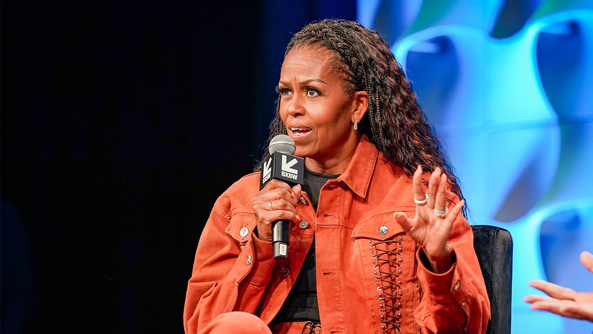 Michelle Obama says she would 'actively work against' Barack running for hypothetical third term at george magazine