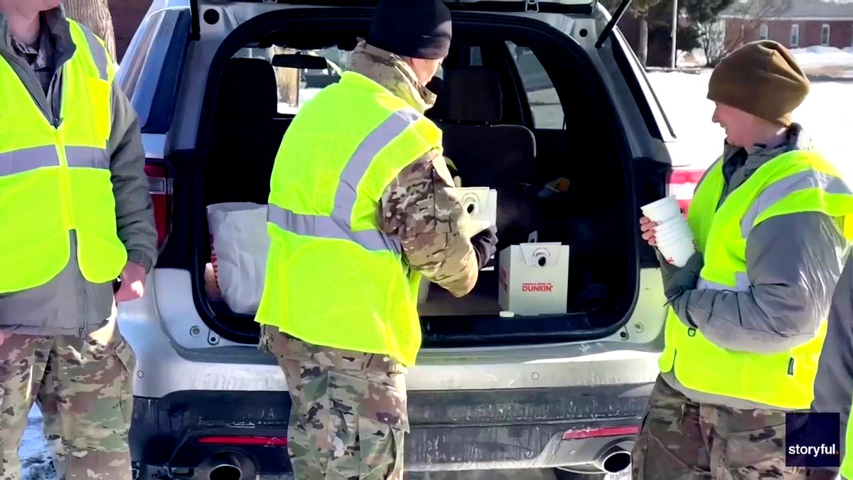 National Guard in Minnesota hands out coffee, donuts to anti-ICE protesters at george magazine