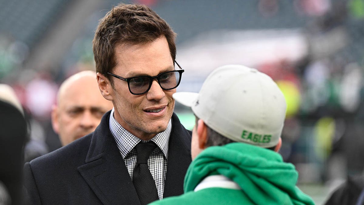 Tom Brady talks Aaron Rodgers' possible retirement, improving in broadcast booth at george magazine