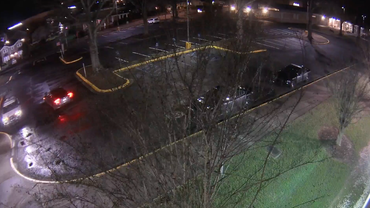 Video shows police officer ambushed in patrol car in explosion of gunfire; suspect found dead after shootout at george magazine