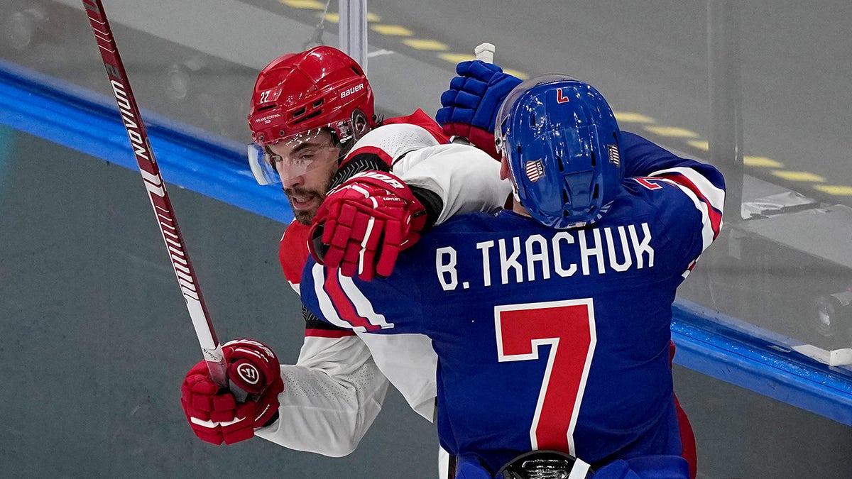 Olympic hockey fans raise Greenland's flag during USA's dominant win over Denmark, sparking viral reaction at george magazine