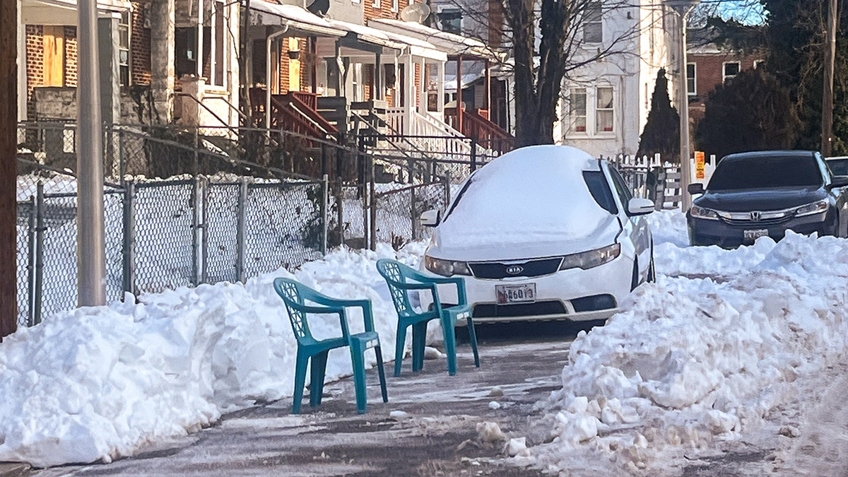 Snowstorm parking wars turn violent as cities crack down, neighbors clash and police warn of escalation at george magazine