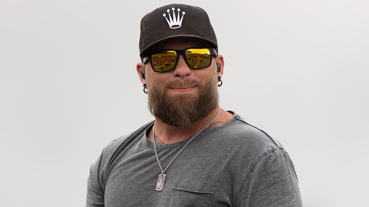 Brantley Gilbert shares why he's performing at Turning Point USA's alternate halftime show at george magazine