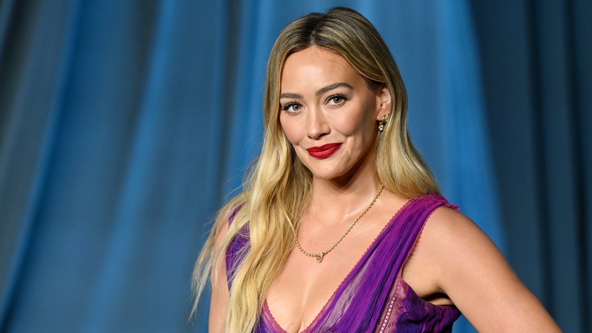 Hilary Duff fires back at critics of her provocative lyrics, says she’s ‘not making music for 7-year-olds’ at george magazine