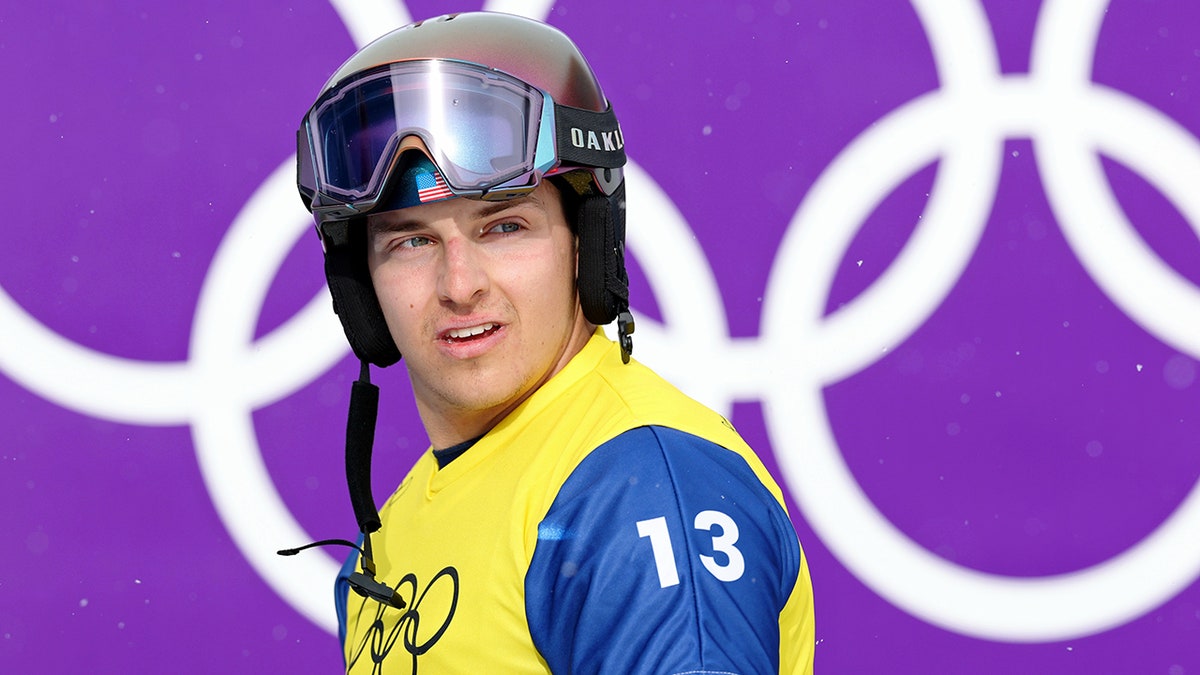 American snowboarder Nathan Pare reacts to disqualification following collision at Milan Cortina Olympics at george magazine