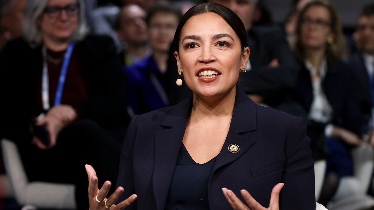 AOC blames critics, Trump after Munich hiccup backlash at george magazine