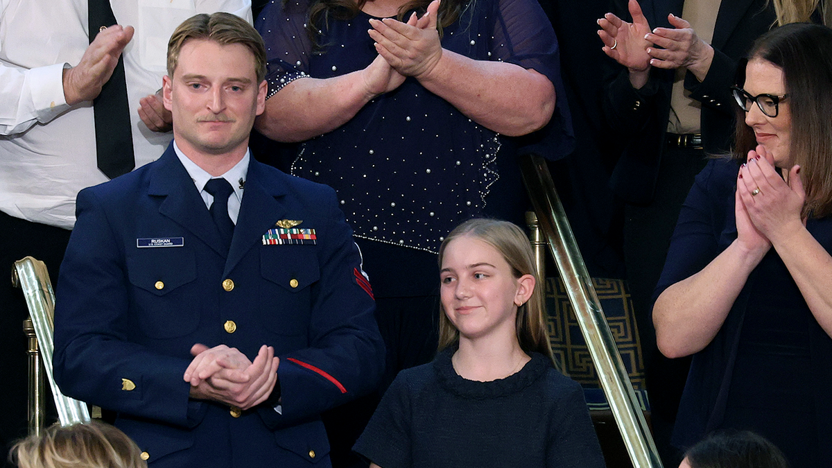 Trump recounts daring Texas flood rescue, reunites camper with Coast Guard swimmer at SOTU at george magazine