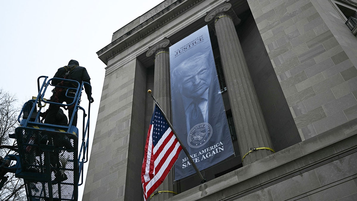 Liberals lose their minds over Justice Department banner featuring Trump at george magazine