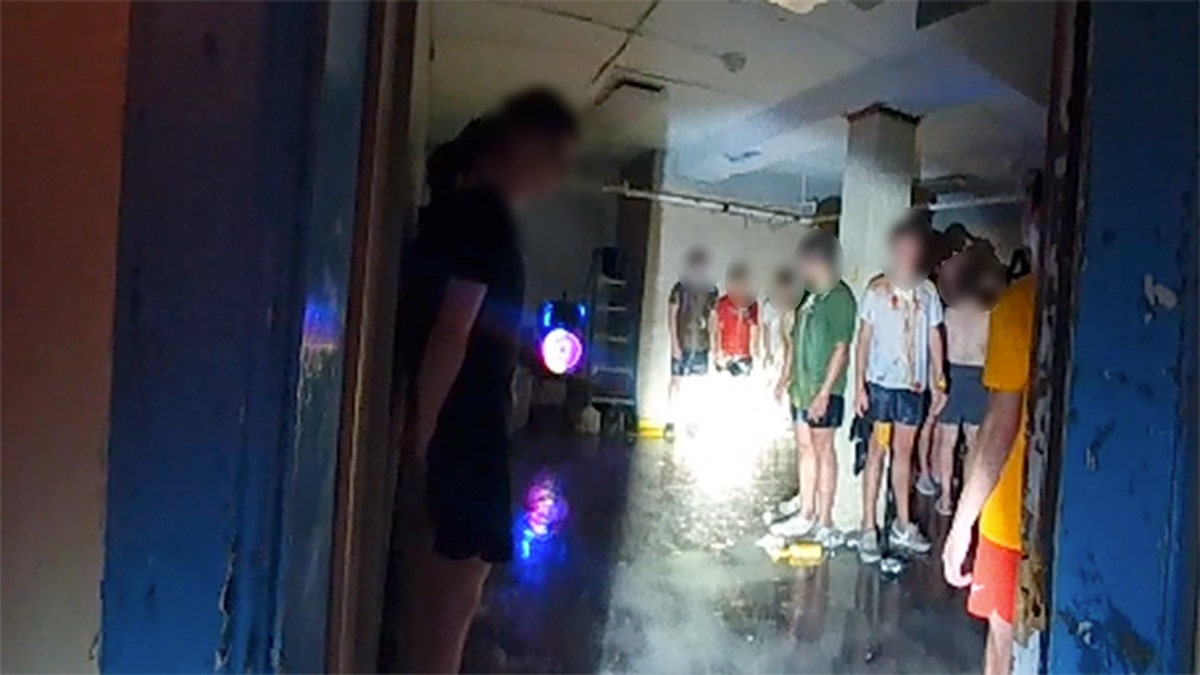 Viral bodycam video shows dozens of college students blindfolded in basement over alleged hazing incident at george magazine