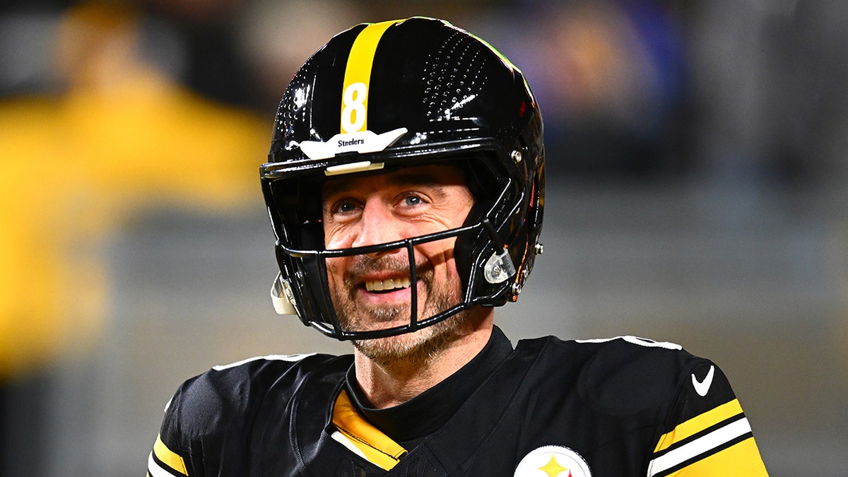 Aaron Rodgers gives cheeky response when asked about reasons to work out at george magazine