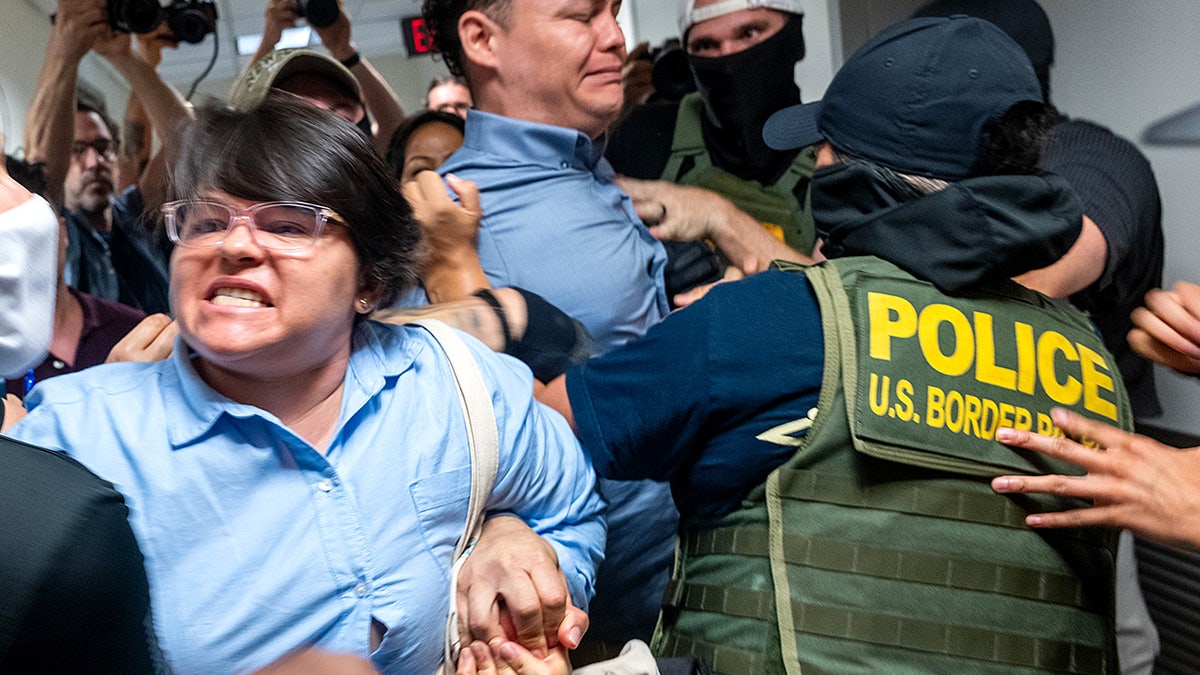 ICE agents told by relatives they will 'answer in hell' as families fracture over politics at george magazine