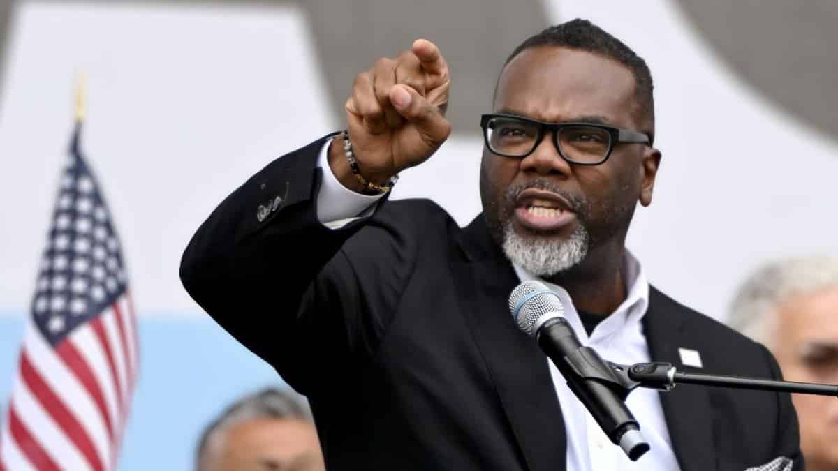 Chicago Mayor Brandon Johnson speaks at a Chicago rally following his executive order targeting ICE activity.