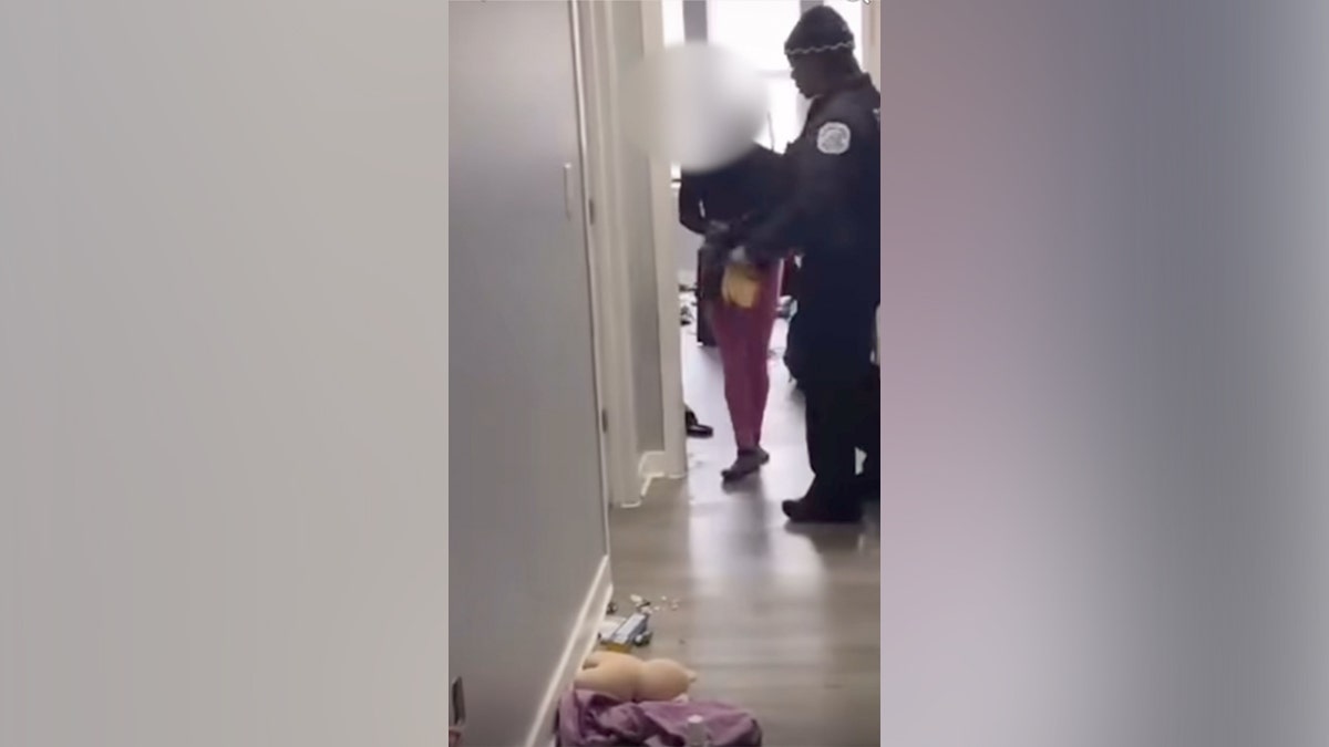 Video shows mother of three confronting alleged squatters after finding two strangers naked in her bed at george magazine