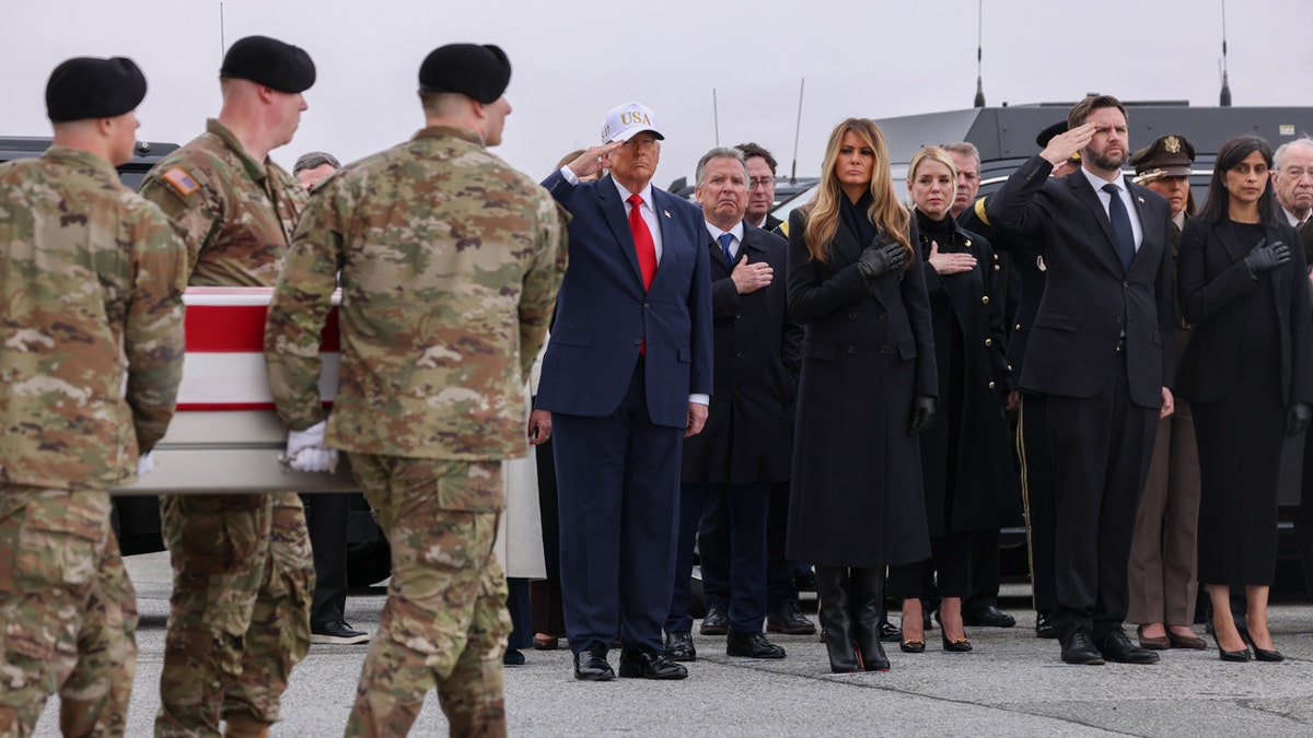 Trump and first lady attend dignified transfer for 6 US troops killed in Kuwait at george magazine