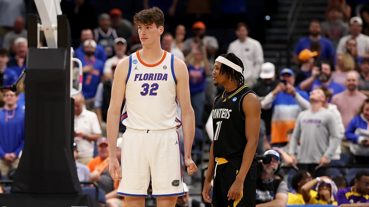 Tallest college basketball player ever towers over 6-foot-8 opponent in viral March Madness moment at george magazine