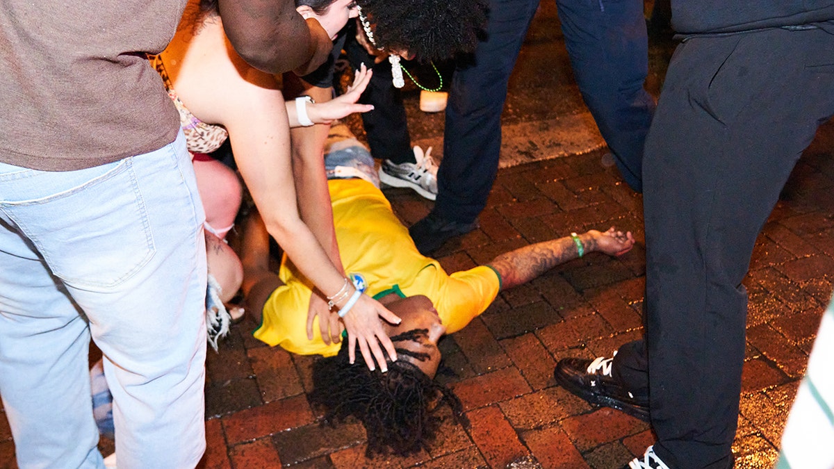 Spring breakers caught on camera viciously attacking man in overnight street brawl at george magazine