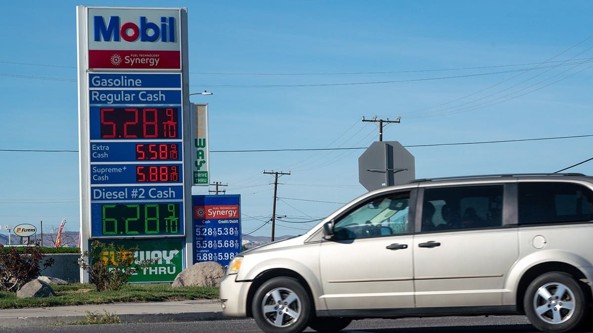 A sign displays the prices of unleaded gasoline and diesel fuel at a Chevron gas station in Victorville, California, US, on Tuesday, March 17, 2026.