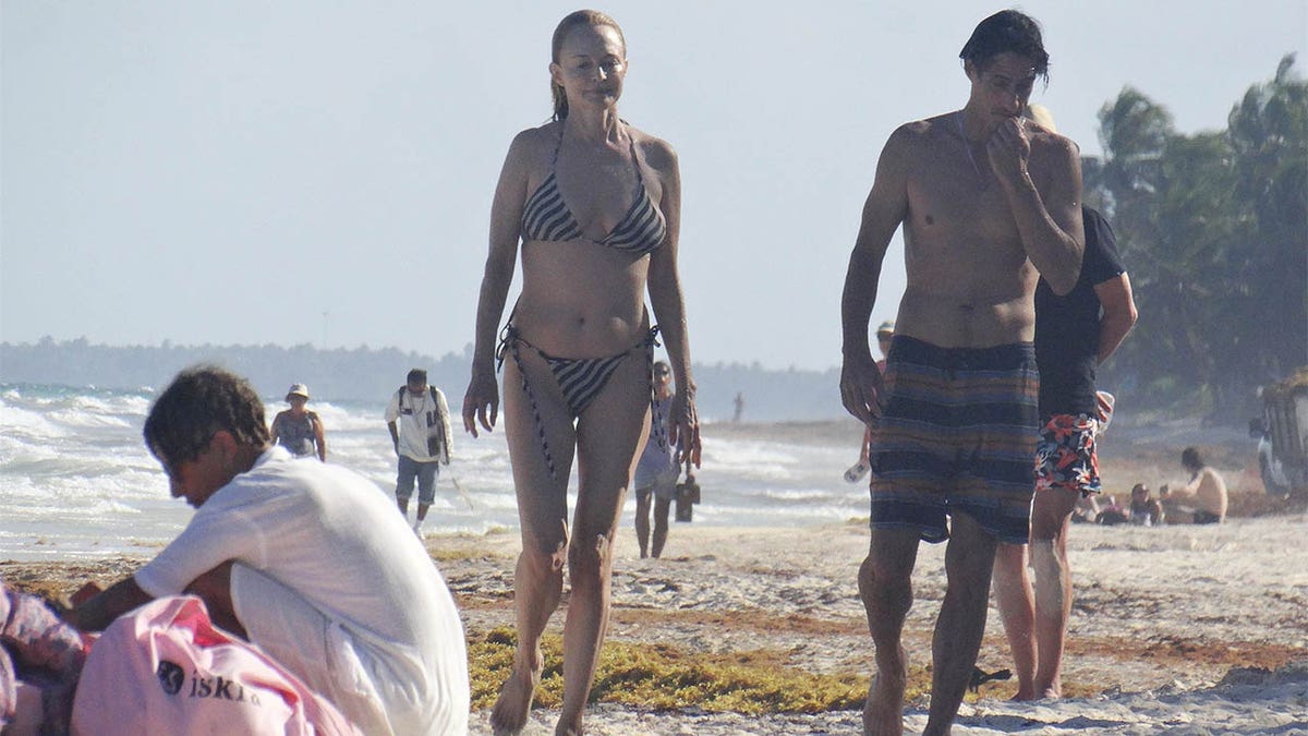 Heather Graham stuns in string bikini as she enjoys 'dream time' with boyfriend on Mexican beach at george magazine