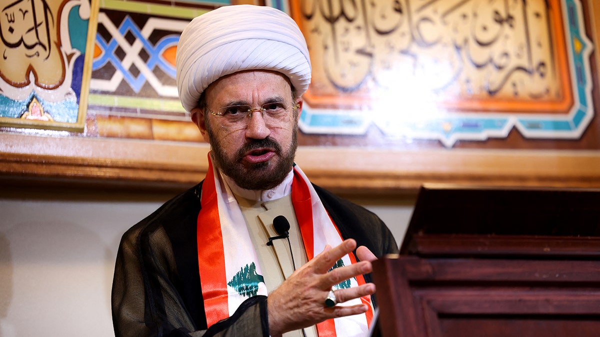 Top Dems brush off ties to Imam who held memorial for Iranian leader who vowed 'Death to America' at george magazine