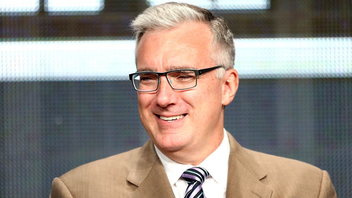 Keith Olbermann under fire for calling Lou Holtz a 'scumbag' after legendary coach's death at george magazine