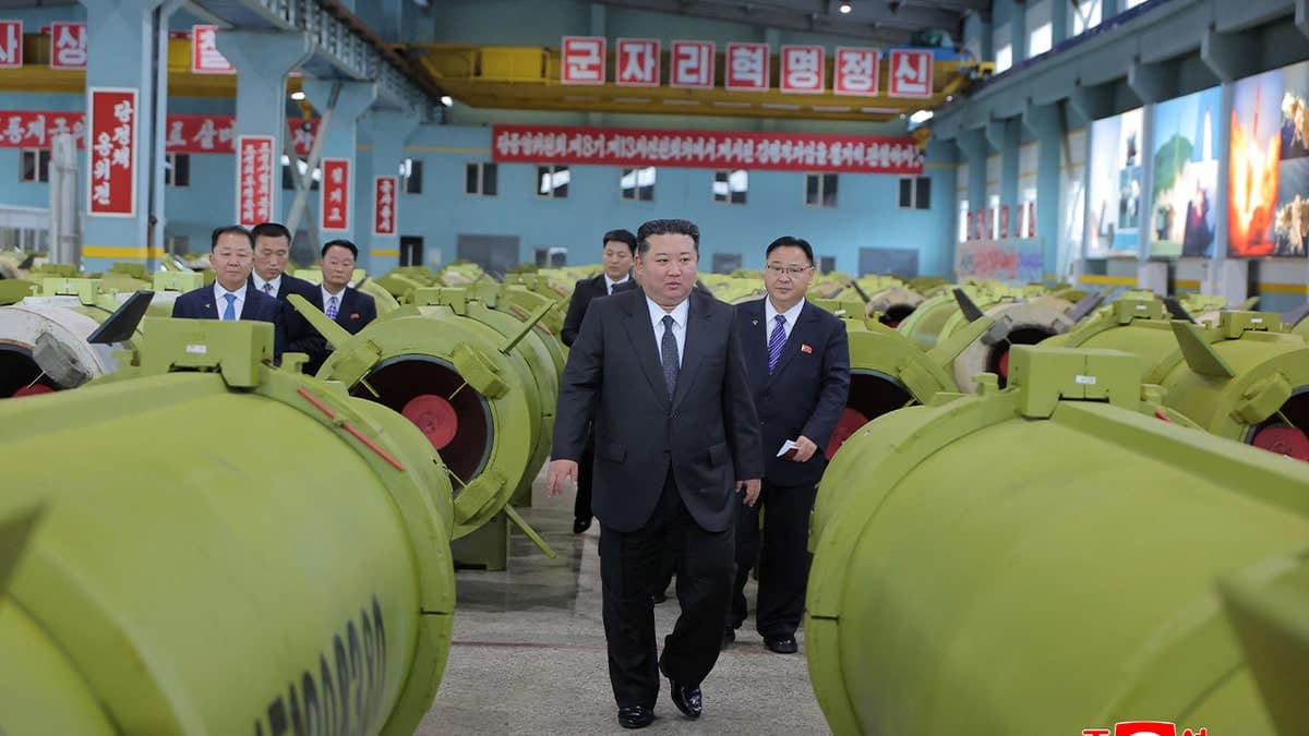 North Korean leader Kim Jong Un visits major munitions enterprises in the last quarter of 2025, in this picture released by North Korea's official Korean Central News Agency on December 26, 2025.