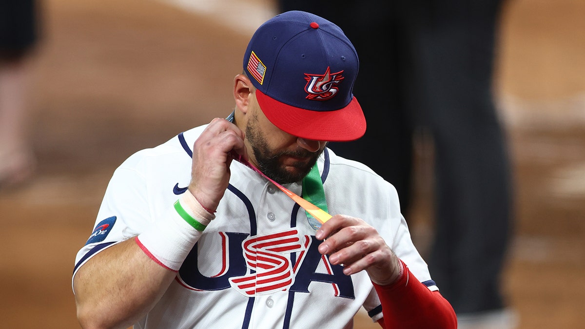 Team USA stars rip silver medals off necks after World Baseball Classic final loss to Venezuela at george magazine