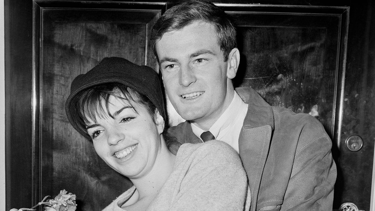 Liza Minnelli says her 'center of gravity crumbled' after finding husband Peter Allen in bed with another man at george magazine