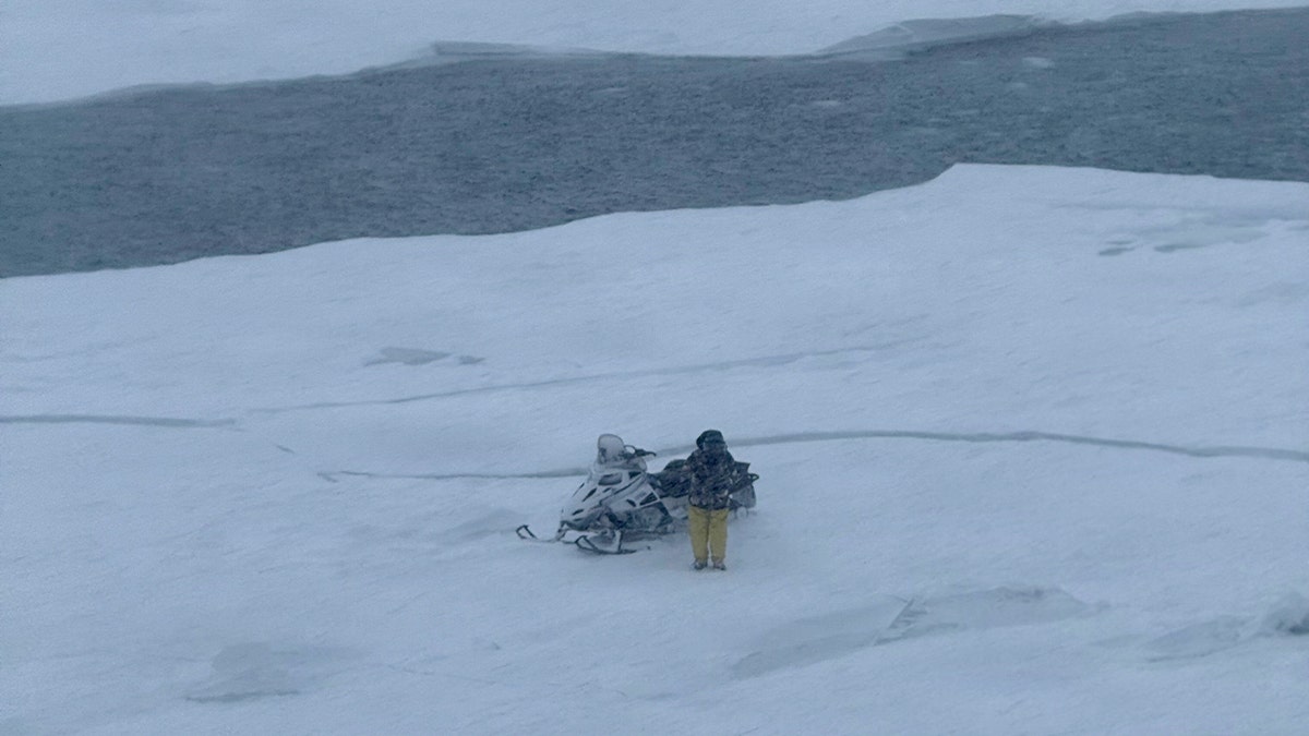 Coast Guard icebreaker rescues snowmobiler stranded on ice during Michigan blizzard at george magazine