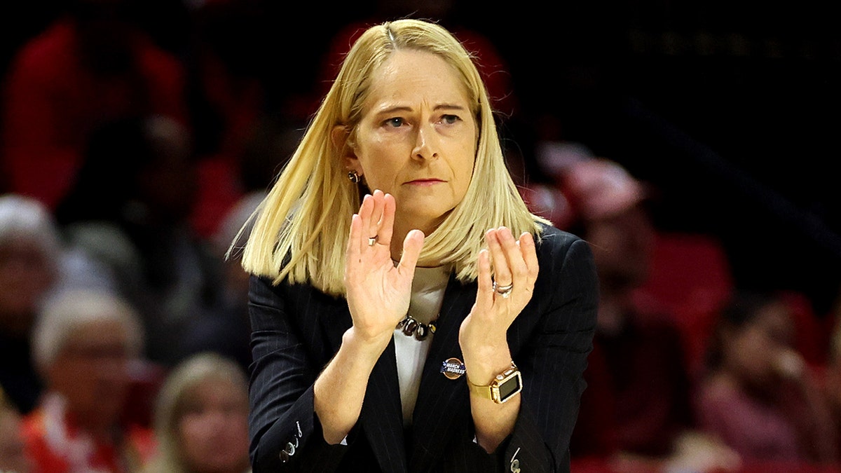 Maryland basketball coach has intense moment with player during March Madness game at george magazine